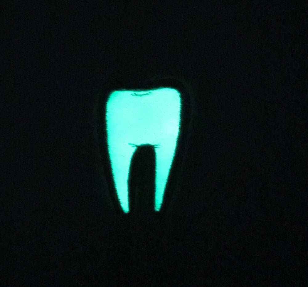 Tooth #2 yellow patch - glow in the dark