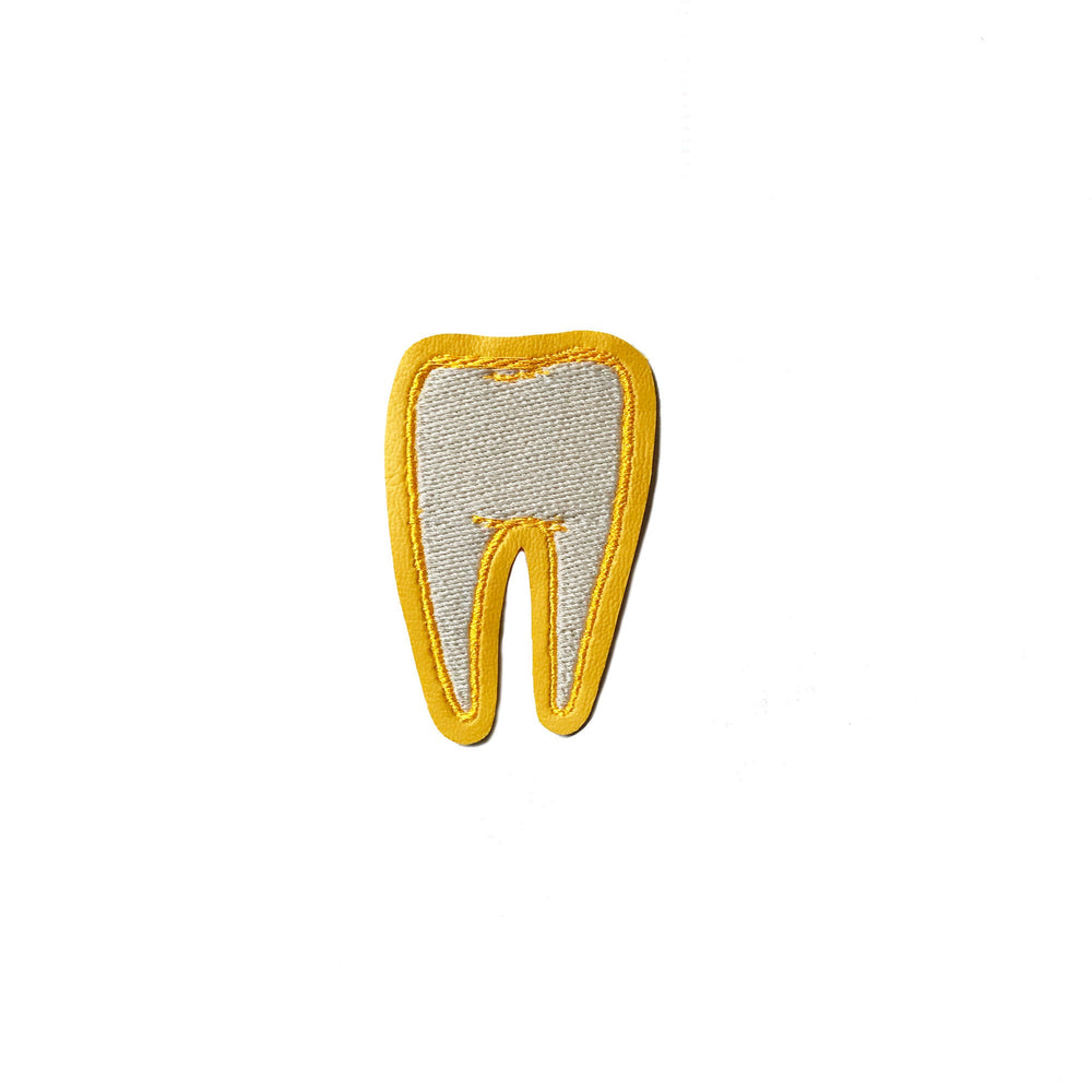 RETURNS IN JANUARY - Tooth #2 yellow patch - glow in the dark